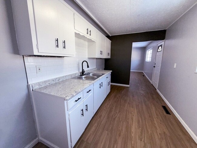 Photo - Move-In Ready 3BR Home w/ Eat-In Kitchen, Yard & Off-Street Parking