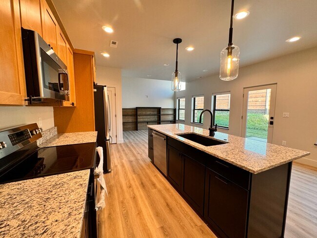 Photo - Modern, Spacious 3-Bedroom Townhome in the...