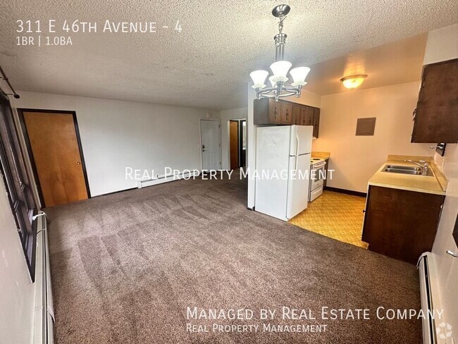 Building Photo - 311 E 46th Ave Unit 4 Rental