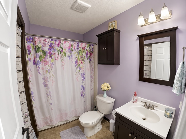 Photo - Indoor Balcony + Pet Friendly + Fenced In Yard + Attached Garage + Washer & Dryer Included! Avail...
