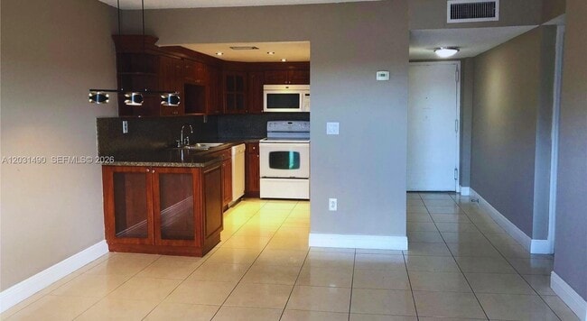 Building Photo - 14250 SW 62nd St Unit 325