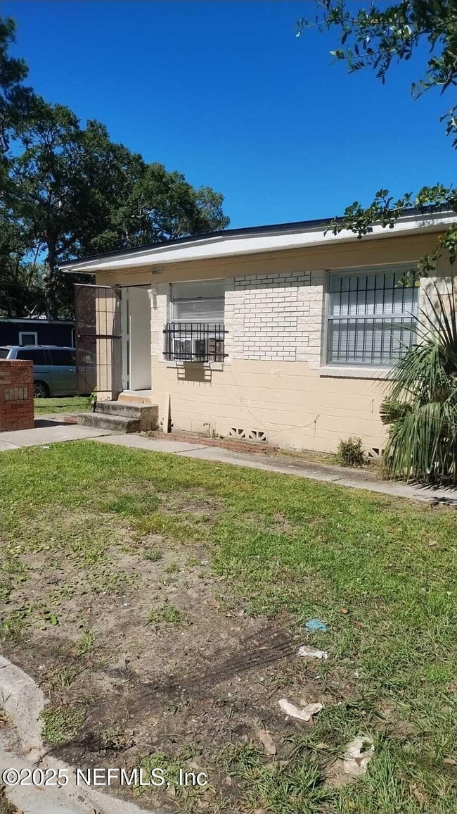 Building Photo - 1599 W 30th St Rental