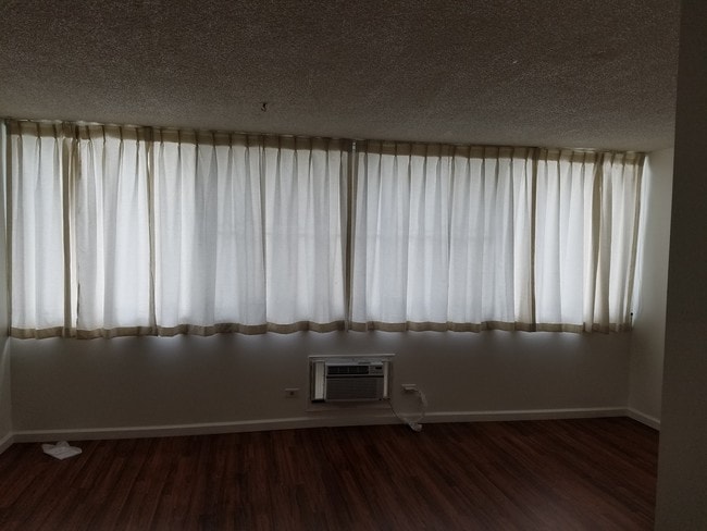 Building Photo - 1560 Kanunu St Unit 914