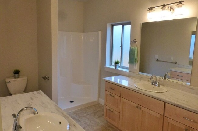Photo - 3 Bed / 2 Bath Two-Story Home with 2-Car Garage & A/C