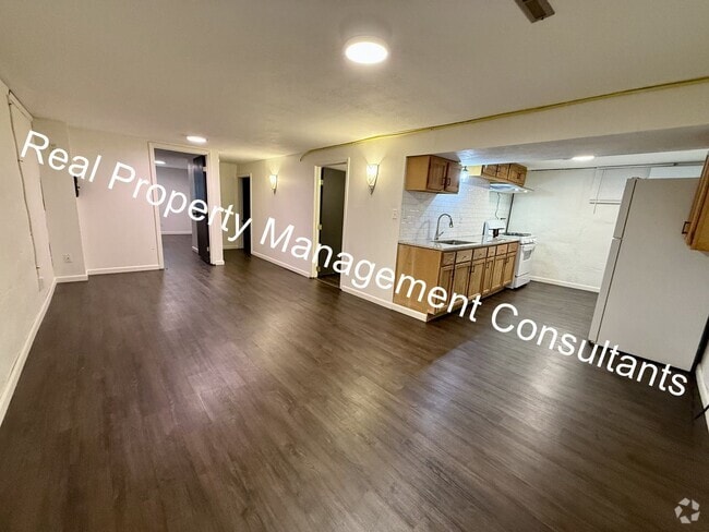 Building Photo - Cozy 2-Bedroom Lower-Level Home – All Util...
