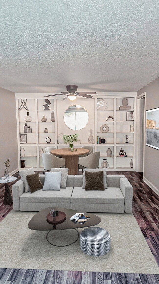 Ingrese a amplias salas de estar diseñadas con grandes ventanas y paletas de colores versátiles, listas para complementar su estilo personal. - Camberwell Apartments