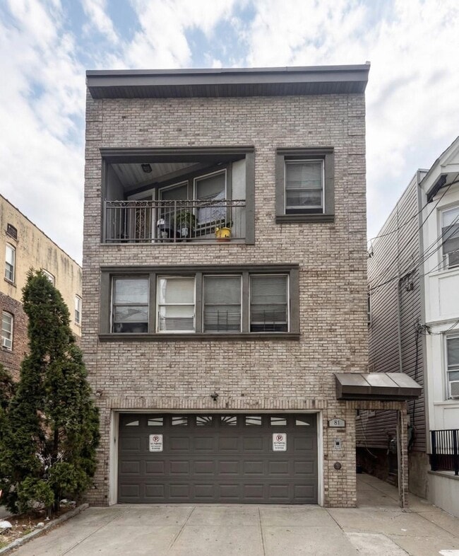 Building Photo - 57 Washburn St Unit 2F