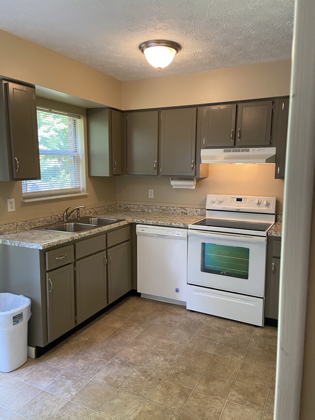 Updated kitchen - 110 Stonetree Drive Townhome