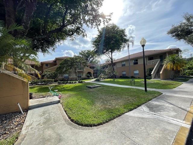 Building Photo - 4815 Via Palm Lakes Unit 1403 Rental