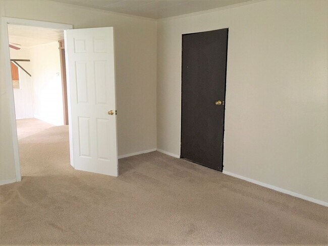 Photo - Three Bedroom Home with Main Floor Laundry on a Large Acre + Lot!!