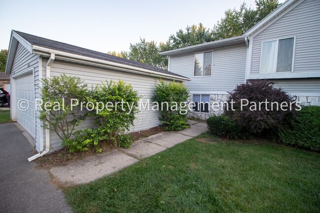 Photo - 2-Bed, 1-Bath Upper Unit with Garage & Porch – Steps from Paul Henry Trail