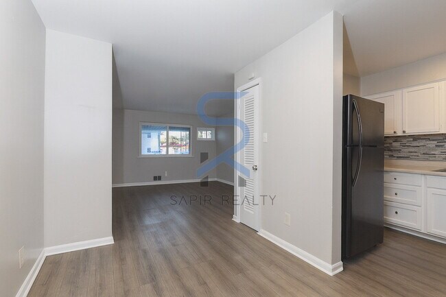 Photo - Move in before November 30th and choose your reward: a $250 Amazon Gift Card or a 55" Smart TV! Unit 2