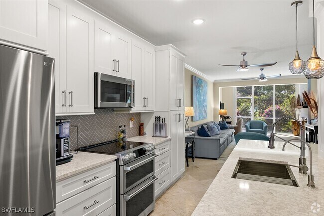 Building Photo - 7087 Barrington Cir Unit 102 Rental