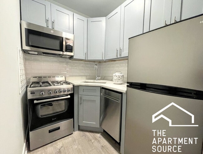 Building Photo - 501 W Belmont Ave Unit 5F