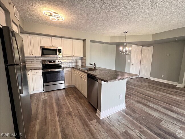 Building Photo - 1240 Wildwood Lakes Blvd Unit 203 Rental