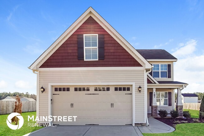 Building Photo - 187 Day Lily St