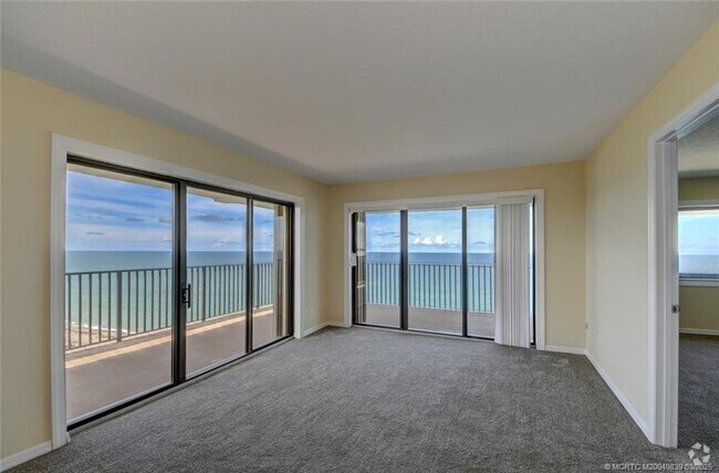 Building Photo - 10044 S Ocean Dr Unit 1202 Rental