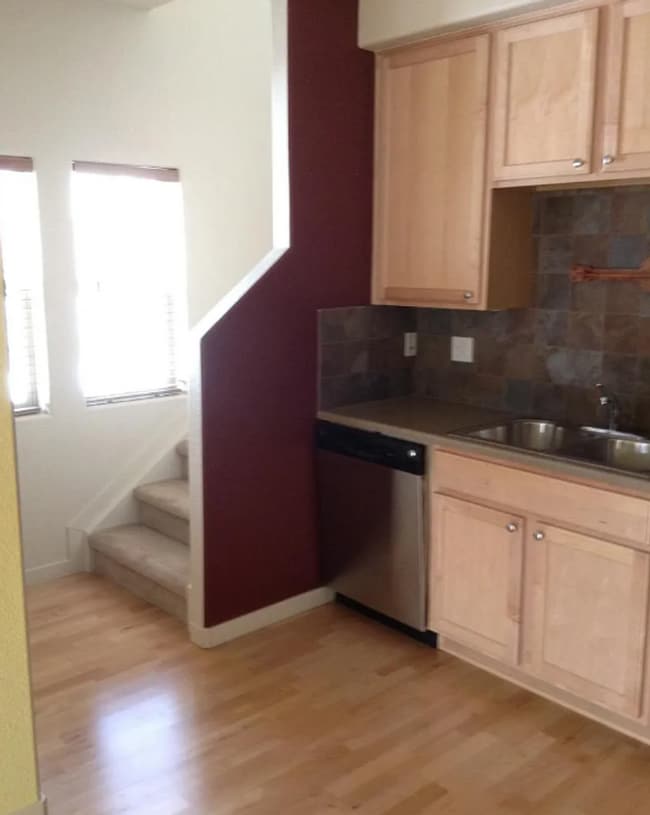 Photo - 2 story, 2 bedroom unit with attached 1 car garage and private yard.