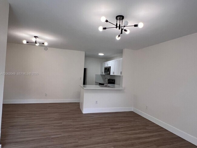Building Photo - 2685 W 66th St Unit 12-20