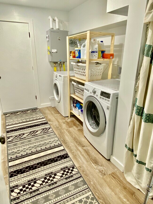 Full size LG washer and dryer. - 4045 54th Ave SW Unit 1 Genesee Gem