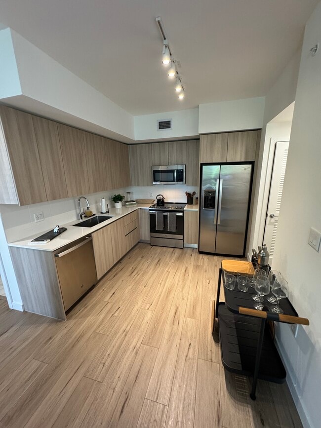 Building Photo - 645 W 76th St Unit A3 Rental
