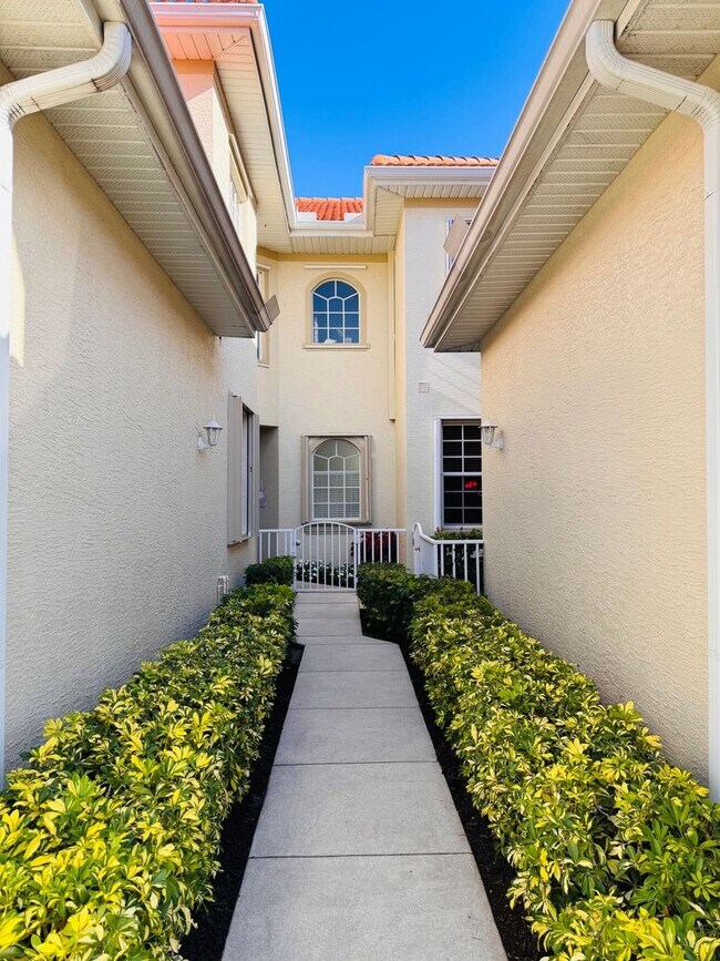 Photo - Experience Bell Tower Park. GATED ground floor 2 Bed 2 Bath Den 1 Car Garage Condo.