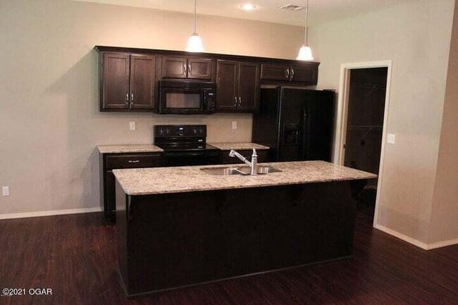 Photo - 5061a Raintree Cir Unit B