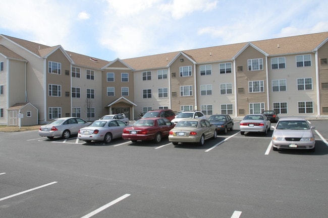 large parking area - Cornerstone Senior Apartments Apartments