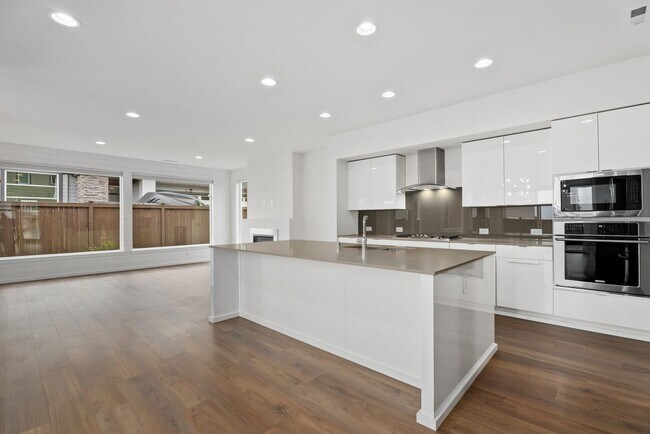 Photo - Spacious 4 bed 2.5 bath home w/ oversize 2 car garage & upgrades throughout!