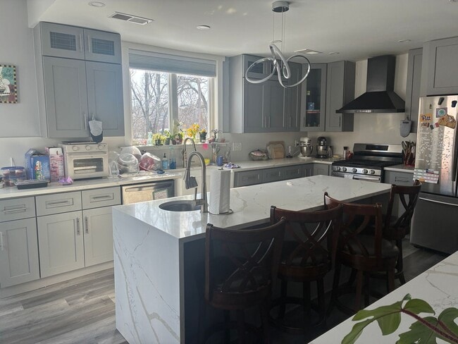 Photo - 4 BED 3.5 BATH RENOVATED HOUSE WITH AC LAUNDRY OUTDOOR SPACE!