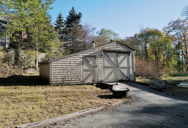 detached garage with wood stove - 252 Cedar St