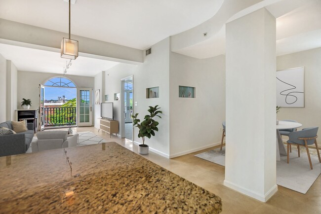 Living and dining area (virtually staged) - Kalorama Park Apartments