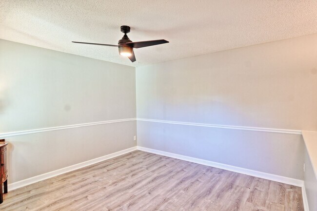 Photo - Spacious 3-Bedroom Condo with Finished Basement & Private Fenced Yard!