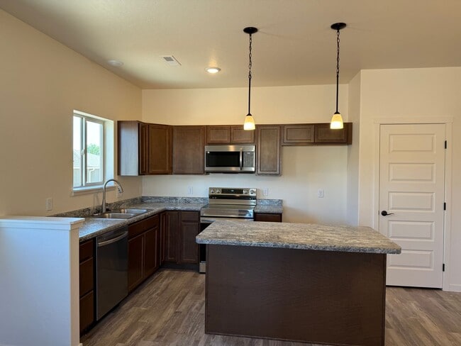 Photo - Available Now.  New 3 bed, 2 bath home on Orchard Mesa