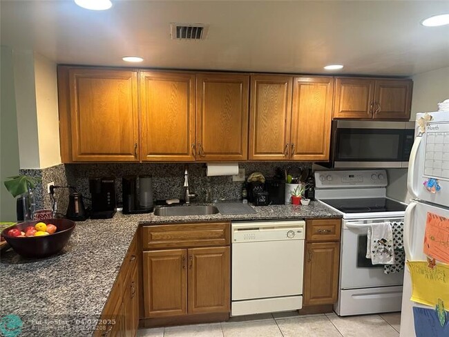 Photo - 3740 Inverrary Dr Condo Unit 1c
