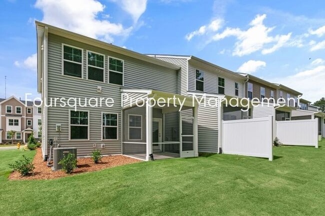 Photo - Spacious End-Unit Townhome with 2nd Floor Loft, Screened-In Porch & 2-Car Garage , High-Speed Int...