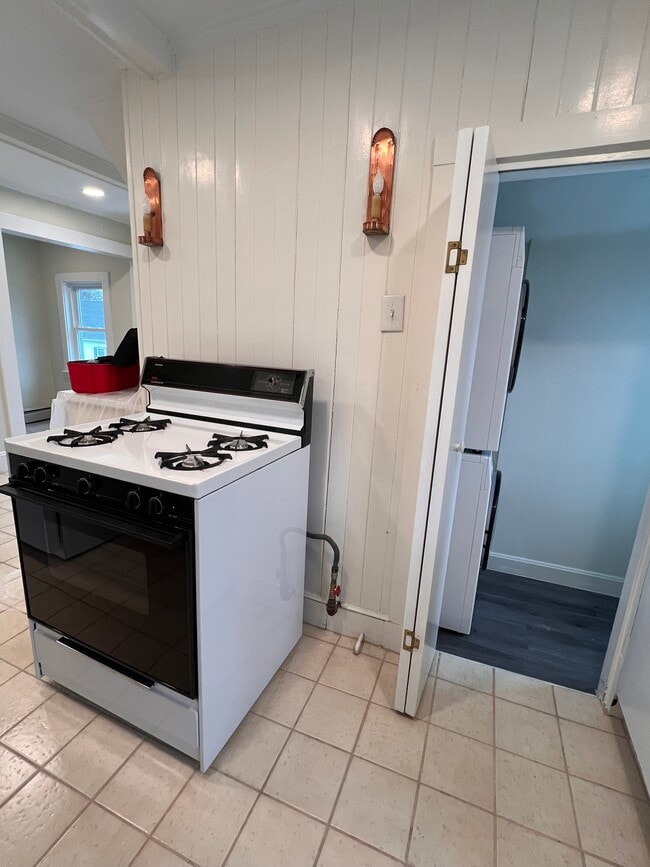 Gas stove, dishwasher being installed - 19 Irving St Unit #3-J