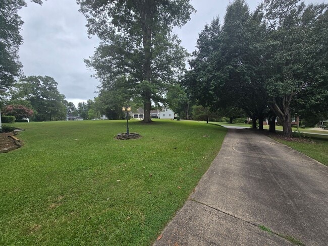 Photo - Quiet Neighborhood- Large Lot- Shed- Enclosed Sunroom! Community Pool & Tennis Courts!