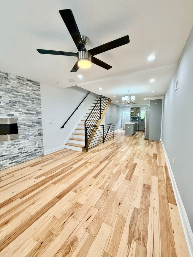 Photo - Modern 3-Bedroom Home with Rooftop Access, Finished Basement & Wet Bar
