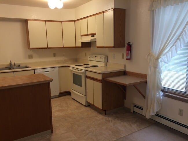 Photo - 700 W 47th Ave Unit #1