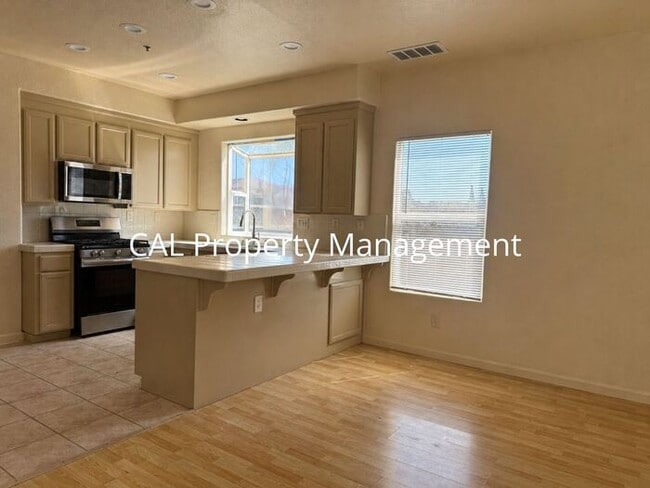 Photo - Stunning 5-Bedroom, 3-Bathroom Home with Fireplace & 2-Car Garage