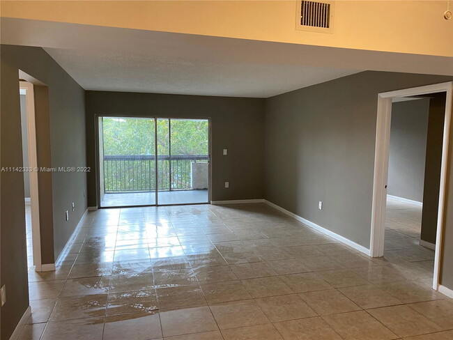 Photo - 711 N Pine Island Rd Condo Unit 401