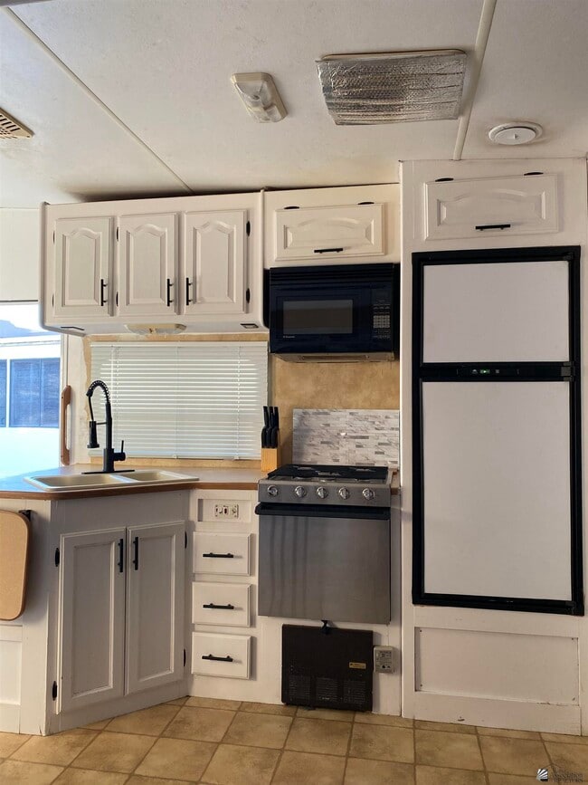 Photo - 12617 E 46th Dr