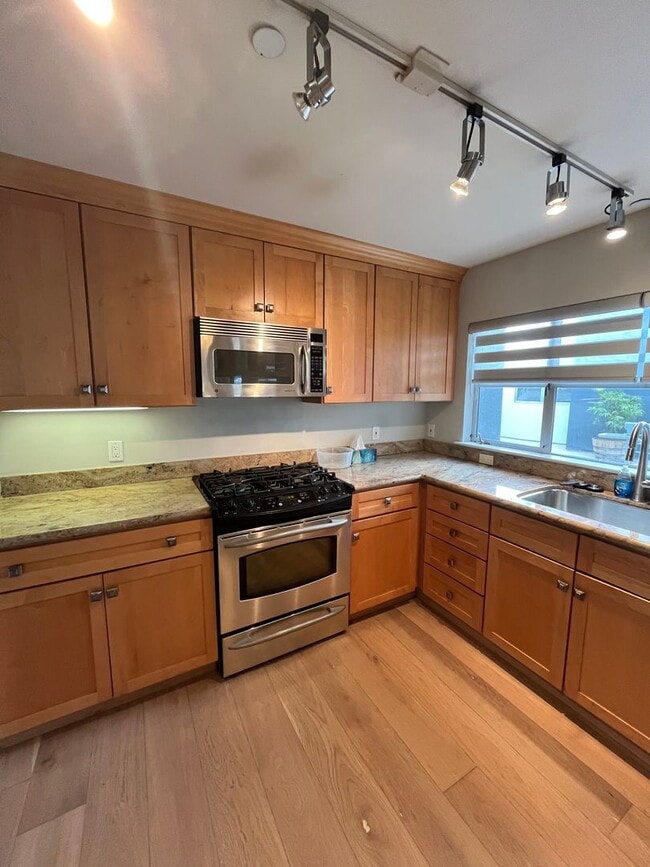 Photo - Beautiful 2BR/1BA with Large Private Patio, Parking & Shared Rooftop Deck in Marina