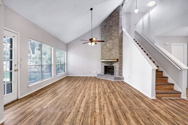 Photo - ***APPLICATION CURRENTLY UNDER REVIEW***Spacious Two-Story with Soaring Ceilings & No Carpet