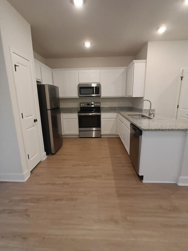 Photo - No Carpet! Gated 3 Bedroom Townhome