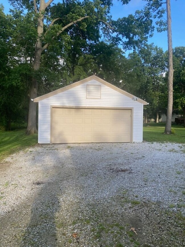 Photo - Ranch home with two car garage located on over 1/2 acre