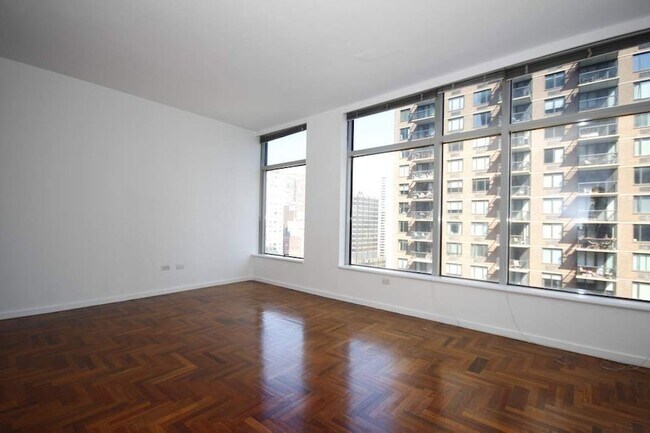 Building Photo - 250 E 54th St Unit 22E Rental