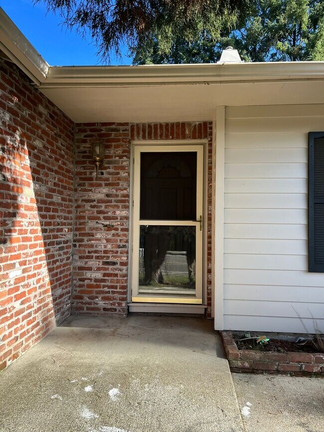 Photo - Beautiful One-Level Home with Sunroom, Vaulted Ceilings & Multiple Living Areas