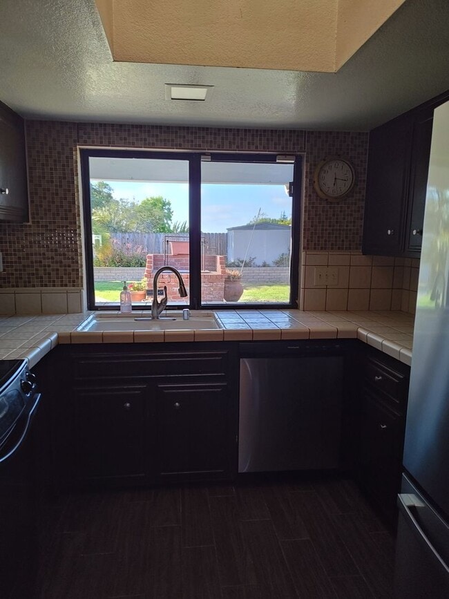 Photo - Charming Single-Story Home with Bonus Space & Beautiful Backyard